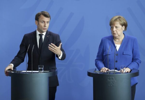 Merkel i Macron za koordiniran pristup članica EU u otvaranju granica